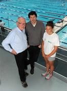 29 February 2012; Ireland’s High Performance Director, Peter Banks Swim along side swimmer Grainne Murphy and International rugby player & Swim Ireland Ambassador Shane Horgan at the opening of the 2012 Cartlon Irish Long Course Championships and Olympics Trials. National Aquatic Centre, Dublin. Picture credit: Brian Lawless / SPORTSFILE
