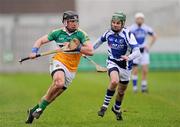 26 February 2012; Shane Dooley, Offaly, in action against Brian Smith, Laois. Allianz Hurling League, Division 1B, Round 1, Offaly v Laois, O'Connor Park, Tullamore, Co. Offaly. Picture credit: Brian Lawless / SPORTSFILE