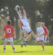 25 February 2012; Gary Savage, Kildare, in action against Maurice Murphy, Cork. Senior All-Ireland Inter-County Football Vocational Schools Final, Kildare v Cork, Moyne-Templetuohy GAA Club, Tipperary. Picture credit: Pat Murphy / SPORTSFILE