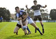 29 February 2012; Phil O'Neill, Newbridge College, with support from team-mate Dan O'Loughlin, goes over to score his side's first try, despite the tackle of Gavin Beere, St. Andrew's College. Leinster Schools Vinny Murray Cup Final, St Andrew's College v Newbridge College, Templeville Road, Dublin. Picture credit: Barry Cregg / SPORTSFILE