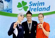 29 February 2012; Gold medal winner in the Women's 200m Freestyle Grainne Murphy, Limerick SC, centre, with Silver medal winner Sycerika McMahon, Leander SC, and Bronze medal winner Bethany Carson, Lisburn City, right, during the Irish Long Course National Swimming Championships/Olympic Trials. National Aquatic Centre, Abbotstown, Dublin. Picture credit: Brian Lawless / SPORTSFILE