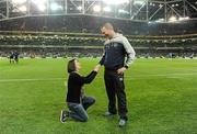 29 February 2012; Brave Martina Connolly, from Islandbridge, Dublin 8, brought the Leap Year legend to life, by proposing to her man during half-time at the Republic of Ireland v Czech Republic match in the Aviva Stadium last night. In the name of love, Presenters Claire Solan and Aidan Power from 98FM’s Morning Crew, acted as conspirators in Martina’s plans to ‘put a ring on it’ with her sweetheart Derek McGill. The shock proposal ended up on the Aviva Stadium’s big screen with Derek saying YES! Martina has been with Derek since 1990 and the couple have two children together and always talked about ‘one day’ getting married. Martina and her new groom shared a passionate and emotional kiss in front of a teary crowd. It was a magical evening for everyone and after the proposal,  Martina and her hubby to be headed up to the FAI VIP suite to enjoy the rest of the game over a glass of champagne. International Friendly, Republic of Ireland v Czech Republic, Aviva Stadium, Lansdowne Road, Dublin. Picture credit: Brendan Moran / SPORTSFILE