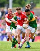 2 July 2017; Tomás Clancy of Cork contests possession with Michael Geaney of Kerry during the Munster GAA Football Senior Championship Final match between Kerry and Cork at Fitzgerald Stadium in Killarney, Co Kerry. Photo by Brendan Moran/Sportsfile
