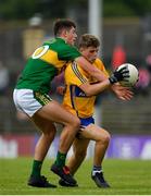 2 July 2017; Ross O'Doherty of Clare is tackled by Adam Donoghue of Kerry during the Electric Ireland Munster GAA Football Minor Championship Final match between Kerry and Clare at Fitzgerald Stadium in Killarney, Co Kerry. Photo by Brendan Moran/Sportsfile