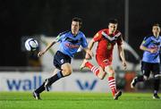 2 March 2012; Robert Benson, UCD, in action against Gearoid Morrissey, Cork City. Airtricity League Premier Division, UCD v Cork City, Belfield Bowl, UCD, Belfield, Dublin. Picture credit: Ray McManus / SPORTSFILE
