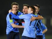 2 March 2012; UCD goalscorer Mark Langtry, second from left, celebrates with team captain Mick Leahy, left, and team-mates Danny Ledwith, 17, and James Kavanagh after scoring the only goal of the game. Airtricity League Premier Division, UCD v Cork City, Belfield Bowl, UCD, Belfield, Dublin. Picture credit: Ray McManus / SPORTSFILE
