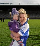 3 March 2012; Three year old Colaiste Ide agus Iosef supporter Emma Collins, from Upper Athea, Limerick, celebrates with corner forward Tara Zgaga after the game. Tesco All-Ireland Post Primary Schools Senior A Semi-Final, St Leo’s, Carlow v Colaiste Ide agus Iosef, Limerick, McDonagh Park, Nenagh, Co. Tipperary. Picture credit: Ray McManus / SPORTSFILE