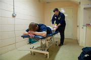 3 March 2012; Graham Geraghty, Meath, receives treatment from team physiotherapist Gerry Nolan before the game. Allianz Football League, Division 2, Round 3, Meath v Kildare, Páirc Táilteann, Navan, Co. Meath. Picture credit: Barry Cregg / SPORTSFILE