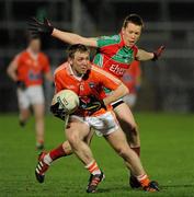 3 March 2012; Paul Duffy, Armagh, in action against Donal Vaughan, Mayo. Allianz Football League, Division 1, Armagh v Mayo, Morgan Athletic Grounds, Armagh. Picture credit: Oliver McVeigh / SPORTSFILE