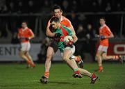 3 March 2012; Ger Cafferkey, Mayo, in action against John Kingham, Armagh. Allianz Football League, Division 1, Armagh v Mayo, Morgan Athletic Grounds, Armagh. Picture credit: Oliver McVeigh / SPORTSFILE