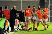 3 March 2012; John Kingham, Armagh, and Aidan O'Shea, Mayo, in dispute as Alan Dillon, Mayo, lies on the ground. Allianz Football League, Division 1, Armagh v Mayo, Morgan Athletic Grounds, Armagh. Picture credit: Oliver McVeigh / SPORTSFILE