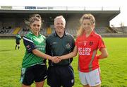 3 March 2012; The Colaiste Ide agus Iosef captain, Laura Sheeran, left, shakes hands with the St Leo’s captain, Jane Moore, across referee Michael Duffy. Tesco All-Ireland Post Primary Schools Senior A Semi-Final, St Leo’s, Carlow v Colaiste Ide agus Iosef, Limerick, McDonagh Park, Nenagh, Co. Tipperary. Picture credit: Ray McManus / SPORTSFILE