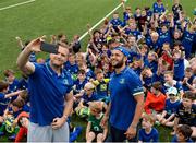 5 July 2017; Jamie Heaslip and Jamison Gibson-Park of Leinster Rugby came out to the Bank of Ireland Summer Camp to meet up with some local young rugby talent in Terenure College RFC. Pictured are Jamie Heaslip, left, and Jamison Gibson-Park, right, as they take a selfie with the young players. Terenure College RFC, Terenure, Dublin. Photo by Seb Daly/Sportsfile