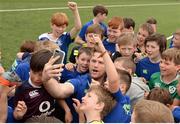 5 July 2017; Jamie Heaslip and Jamison Gibson-Park of Leinster Rugby came out to the Bank of Ireland Summer Camp to meet up with some local young rugby talent in Terenure College RFC. Pictured is Jamie Heaslip with the young players. Terenure College RFC, Terenure, Dublin. Photo by Seb Daly/Sportsfile