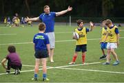 5 July 2017; Jamie Heaslip and Jamison Gibson-Park of Leinster Rugby came out to the Bank of Ireland Summer Camp to meet up with some local young rugby talent in Terenure College RFC. Pictured is Leinster's Jamie Heaslip during a coaching exercise with the players. Terenure College RFC, Terenure, Dublin. Photo by Seb Daly/Sportsfile