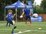 5 July 2017; Jamie Heaslip and Jamison Gibson-Park of Leinster Rugby came out to the Bank of Ireland Summer Camp to meet up with some local young rugby talent in Terenure College RFC. Pictured is Max Morton, from Terenure, Dublin, during a coaching exercise with Leinster's Jamison Gibson-Park. Terenure College RFC, Terenure, Dublin. Photo by Seb Daly/Sportsfile
