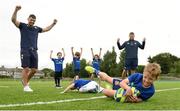 5 July 2017; Rob Kearney, far left, and Ross Byrne, far right, of Leinster Rugby came out to the Bank of Ireland Leinster Rugby Summer Camp at Donnybrook Stadium. Pictured scoring a try during camp is Paul Batten and fellow Under-7 campers, Ross McGowan in defence, and from centre left, Emily Delle Chiaie, Alfie Stephenson, and Savannah Stephenson. Photo by Cody Glenn/Sportsfile