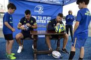 5 July 2017; Rob Kearney and Ross Byrne of Leinster Rugby came out to the Bank of Ireland Leinster Rugby Summer Camp at Donnybrook Stadium. Pictured are Kearney and Byrne signing autographs at Donnybrook Stadium in Dublin. Photo by Cody Glenn/Sportsfile