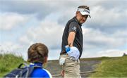 5 July 2017; Ian Poulter of England hands back a cap after signing an autograph during the Pro-Am ahead of the Dubai Duty Free Irish Open Golf Championship at Portstewart Golf Club in Portstewart, Co. Derry. Photo by Brendan Moran/Sportsfile