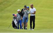 5 July 2017; Rory McIlroy of Northern Ireland and Manchester City manager Pep Guardiola get a selfie, with club member and caddie to Pep Guardiola, Vincent Cooley, during the Pro-Am ahead of the Dubai Duty Free Irish Open Golf Championship at Portstewart Golf Club in Portstewart, Co. Derry. Photo by Brendan Moran/Sportsfile