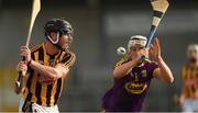 5 July 2017; James Burke of Kilkenny clears under pressure from Cathal Dunbar of Wexford during the Bord Gais Energy Leinster GAA Hurling Under 21 Championship Final Match between Kilkenny and Wexford at Nowlan Park in Kilkenny. Photo by Ray McManus/Sportsfile