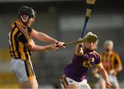 5 July 2017; James Burke of Kilkenny clears under pressure from Cathal Dunbar of Wexford during the Bord Gais Energy Leinster GAA Hurling Under 21 Championship Final Match between Kilkenny and Wexford at Nowlan Park in Kilkenny. Photo by Ray McManus/Sportsfile