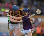 5 July 2017; John Donnelly of Kilkenny in action against Shane Reck of Wexford during the Bord Gais Energy Leinster GAA Hurling Under 21 Championship Final Match between Kilkenny and Wexford at Nowlan Park in Kilkenny. Photo by Ray McManus/Sportsfile