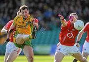 4 March 2012; Michael Murphy, Donegal, in action against Eoin O'Mahony, Cork. Allianz Football League Division 1, Round 3, Donegal v Cork, MacCumhaill Park, Ballybofey, Co. Donegal. Picture credit: Oliver McVeigh / SPORTSFILE