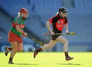 4 March 2012; Tanya Stamp, Oulart-the-Ballagh, in action against Therese Shortt, Drom/Inch. All Ireland Senior Camogie Club Championship Final 2011, Drom/Inch, Tipperary v Oulart-the-Ballagh, Wexford, Croke Park, Dublin. Picture credit: Brian Lawless / SPORTSFILE