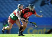4 March 2012; Aideen Brennan, Oulart-the-Ballagh, in action against Patricia McGrath, Drom/Inch. All Ireland Senior Camogie Club Championship Final 2011, Drom/Inch, Tipperary v Oulart-the-Ballagh, Wexford, Croke Park, Dublin. Picture credit: Brian Lawless / SPORTSFILE
