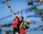 4 March 2012; Lorraine Bourke, Drom/Inch, in action against Ursula Jacob, Oulart-the-Ballagh. All Ireland Senior Camogie Club Championship Final 2011, Drom/Inch, Tipperary v Oulart-the-Ballagh, Wexford, Croke Park, Dublin. Picture credit: Brian Lawless / SPORTSFILE