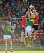 4 March 2012; Kieran Donaghy, Kerry, contests a high ball with Dan Gordan, left, and Kalum King, Down. Allianz Football League, Division 1, Round 3, Down v Kerry, Pairc Esler, Newry, Co. Down. Picture credit: Stephen McCarthy / SPORTSFILE