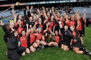 4 March 2012; The Oulart-the-Ballagh players celebrate with the cup. All Ireland Senior Camogie Club Championship Final 2011, Drom/Inch, Tipperary v Oulart-the-Ballagh, Wexford, Croke Park, Dublin. Picture credit: Brian Lawless / SPORTSFILE