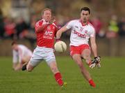 4 March 2012; Kyle Coney, Tyrone, in action against Ronan Greene, Louth. Allianz Football League, Division 2, Round 3, Louth v Tyrone, County Grounds, Drogheda, Co. Louth. Photo by Sportsfile