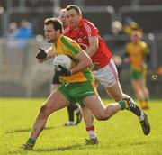 4 March 2012; Michael Murphy, Donegal, in action against Paul Kerrigan, Cork. Allianz Football League Division 1, Round 3, Donegal v Cork, MacCumhaill Park, Ballybofey, Co. Donegal. Picture credit: Oliver McVeigh / SPORTSFILE