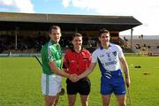 4 March 2012; The Leinster captain, Jackie Tyrrell, and the Connacht captain Fergal Moore, shake hands across referee Colm Lyons before the game. M. Donnelly Interprovincial Hurling Championship Final, Leinster v Connacht, Nowlan Park, Kilkenny. Picture credit: Ray McManus / SPORTSFILE