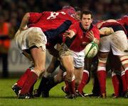 1 December 2001; Guy Easterby, Llanelli makes a pass to his backs, watched by brother Simon (8). Munster v Llanelli, Celtic League quarter-final, Thomond Park, Limerick. Rugby. Picture credit; Brendan Moran / SPORTSFILE
