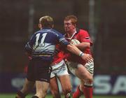 15 December 2001; Munster's Anthony Horgan is tackled by Gordon, Leinster. Leinster v Munster, Celtic League Final, Lansdowne, Dublin. Rugby. Picture credit; Brendan Moran / SPORTSFILE