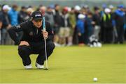 7 July 2017; Paul Dunne of Ireland lines up a putt on the 13th green during Day 2 of the Dubai Duty Free Irish Open Golf Championship at Portstewart Golf Club in Portstewart, Co Derry. Photo by Brendan Moran/Sportsfile