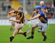 26 February 2012; Paddy Hogan, Kilkenny, in action against James Woodlock, Tipperary. Allianz Hurling League, Division 1A, Round 1, Kilkenny v Tipperary, Nowlan Park, Kilkenny. Picture credit: Matt Browne / SPORTSFILE