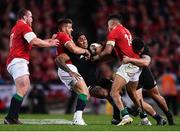 8 July 2017; Malakai Fekitoa of New Zealand is tackled by British and Irish Lions players, from left, Jack McGrath, Rhys Webb and Anthony Watson during the Third Test match between New Zealand All Blacks and the British & Irish Lions at Eden Park in Auckland, New Zealand. Photo by Stephen McCarthy/Sportsfile