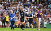 8 July 2017; Naomhan Rossiter is shown a black card by referee Conor Lane during the GAA Football All-Ireland Senior Championship Round 2B match between Wexford and Monaghan at Innovate Wexford Park in Co Wexford. Photo by Eóin Noonan/Sportsfile