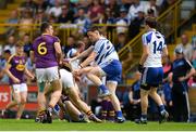 8 July 2017; Conor McManus of Monaghan stamping on Jim Rossiter of Wexford and is ultimately shown a black card by referee Conor Lane during the GAA Football All-Ireland Senior Championship Round 2B match between Wexford and Monaghan at Innovate Wexford Park in Co Wexford. Photo by Eóin Noonan/Sportsfile