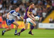 8 July 2017; Kevin O'Grady of Wexford in action against Ryan Wylie of Monaghan during the GAA Football All-Ireland Senior Championship Round 2B match between Wexford and Monaghan at Innovate Wexford Park in Co Wexford. Photo by Eóin Noonan/Sportsfile