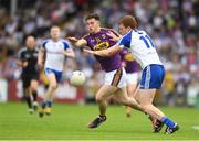 8 July 2017; John Tubritt of Wexford in action against Kieran Duffy of Monaghan during the GAA Football All-Ireland Senior Championship Round 2B match between Wexford and Monaghan at Innovate Wexford Park in Co Wexford. Photo by Eóin Noonan/Sportsfile