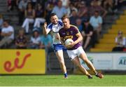 8 July 2017; PJ Banville of Wexford in action against Owen Duffy of Monaghan during the GAA Football All-Ireland Senior Championship Round 2B match between Wexford and Monaghan at Innovate Wexford Park in Co Wexford. Photo by Eóin Noonan/Sportsfile