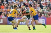 8 July 2017; Diarmuid O'Connor of Mayo in action against Cian O'Dea, left, and Cathal O'Connor of Clare during the GAA Football All-Ireland Senior Championship Round 3A match between Clare and Mayo at Cusack Park in Ennis, Co Clare. Photo by Diarmuid Greene/Sportsfile