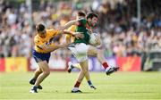 8 July 2017; Chris Barrett of Mayo in action against Dean Ryan of Clare during the GAA Football All-Ireland Senior Championship Round 3A match between Clare and Mayo at Cusack Park in Ennis, Co Clare. Photo by Diarmuid Greene/Sportsfile