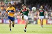 8 July 2017; Chris Barrett of Mayo in action against Dean Ryan of Clare during the GAA Football All-Ireland Senior Championship Round 3A match between Clare and Mayo at Cusack Park in Ennis, Co Clare. Photo by Diarmuid Greene/Sportsfile