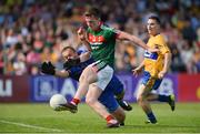 8 July 2017; Cillian O'Connor of Mayo shoots to score his side's first goal past Clare goalkeeper Joe Hayes during the GAA Football All-Ireland Senior Championship Round 3A match between Clare and Mayo at Cusack Park in Ennis, Co Clare. Photo by Diarmuid Greene/Sportsfile